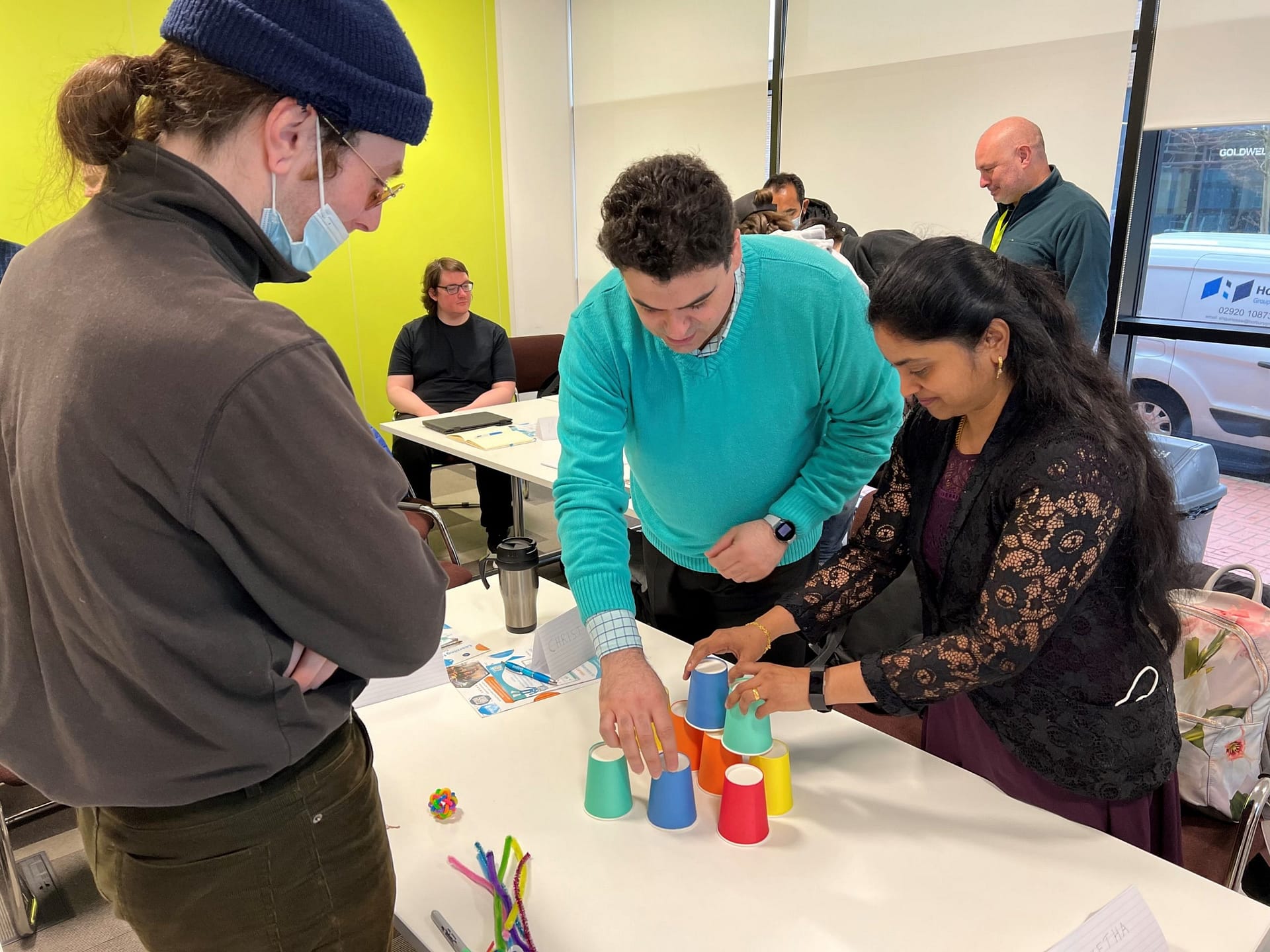 Cup stacking process team building activity at FinTech Back-End